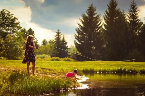 Girl fishing in a park